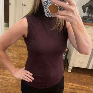 Sleeveless mockneck top